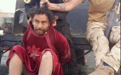 حقيقة صورة القبض على داعشي يرتدي فستان في مصر