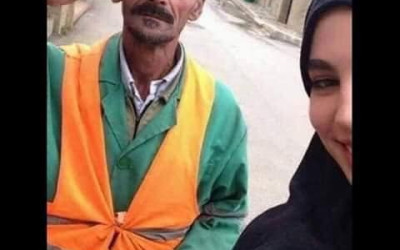 حقيقة صورة الطبيبة السورية مع أبيها عامل النظافة
